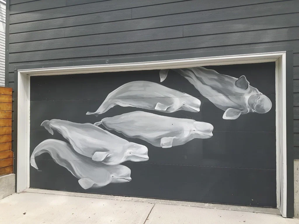 garage door with painting of beluga whales